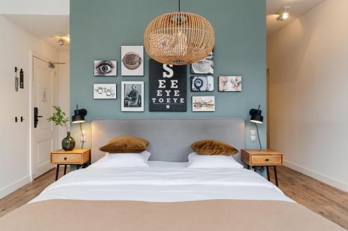 Postel nebo postele na pokoji v ubytování Eye Hotel