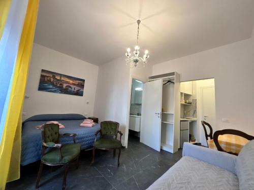 Postel nebo postele na pokoji v ubytování MinihouseLarissa diVerona