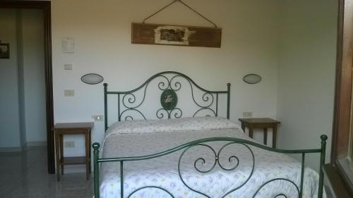 Postel nebo postele na pokoji v ubytování Agriturismo La Cantina VIA CAMPIGLIONE DI ASSISI