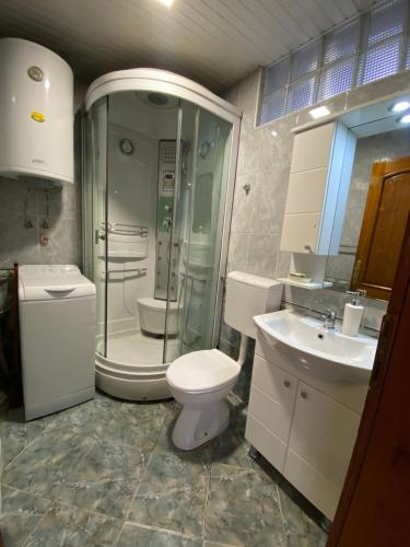 Ein Badezimmer in der Unterkunft Kozle Apartment
