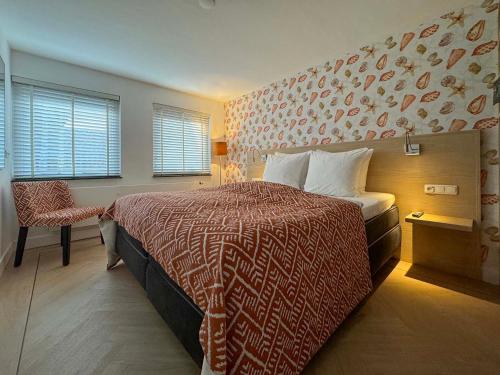 Letto o letti in una camera di Badhotel Bruin