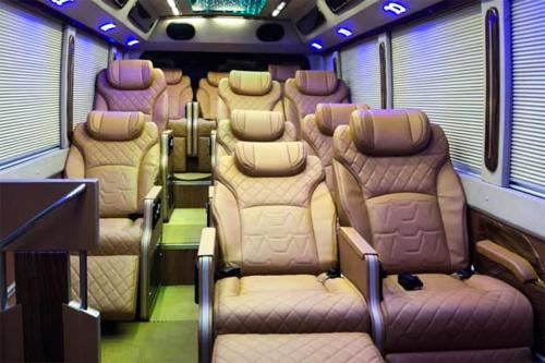 a bus with rows of seats in a room at Hanoi EcoStay 1 hostel in Hanoi