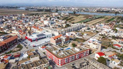 an aerial view of a city with buildings at Les Orenetes de Sant Jaume in Sant Jaume d'Enveja