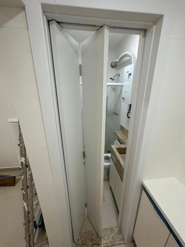 a bathroom with a shower and a toilet at Apartamento in Rio de Janeiro