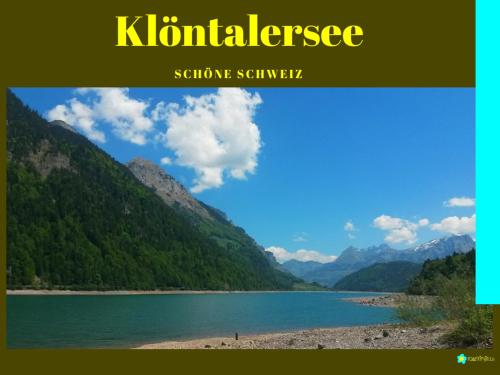a view of a lake with mountains in the background at Ferienwohnung Bergzyt oder das Bed and Breakfast - Älplersuite mit eigenem Bad und Terrasse in Linthal