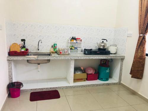 Η κουζίνα ή μικρή κουζίνα στο Homestay D'Art Container