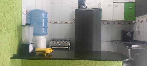 Kuchyň nebo kuchyňský kout v ubytování Apartamento Três Quartos