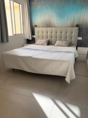 En eller flere senge i et værelse på Apartamento SARA Playa Jandia