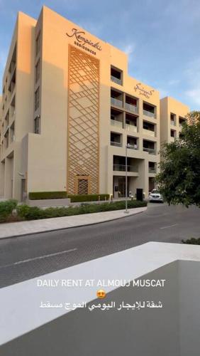 a rendering of a building on a city street at Lyoan home in Ḩayl Āl ‘Umayr