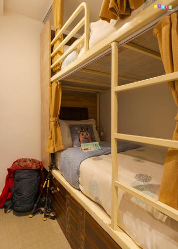 a bedroom with two bunk beds in a room at Flock Kathmandu in Kathmandu