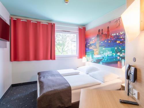 Voodi või voodid majutusasutuse B&B Hotel Passau toas