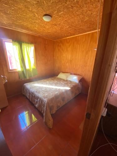 Voodi või voodid majutusasutuse Pieza Triple, Villa Cerro Castillo, Baño y Areas Compartidas toas