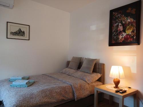 Ein Bett oder Betten in einem Zimmer der Unterkunft Deluxe studio & apartments Alexander