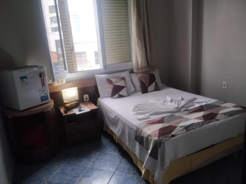 Postel nebo postele na pokoji v ubytování Hotel Ype de São Carlos