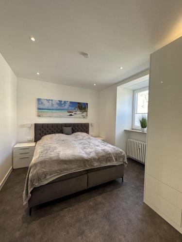 מיטה או מיטות בחדר ב-3-LIVING Apartment Houses