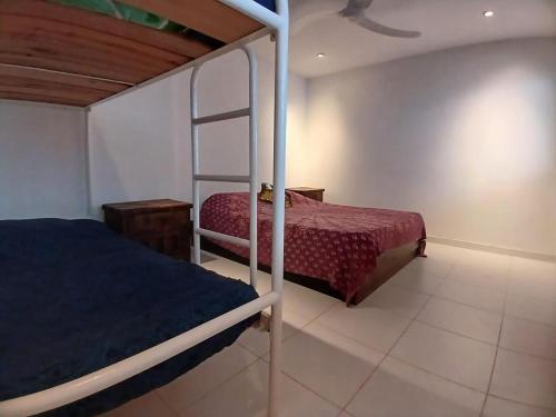 Cama o camas de una habitación en Isla Tortuga - Prado - Deportes Náuticos - Cerca a Bogotá - Cerca a Ibagué
