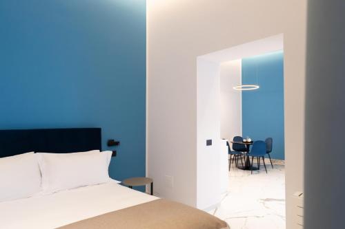 Кровать или кровати в номере InSogno Suites