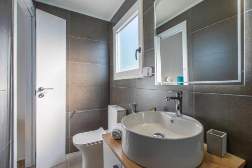 Koupelna v ubytování Kedria Lounge and infinity sea view residence