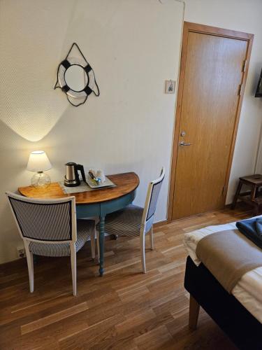 Coin salon dans l'établissement Hotell Alderholmen
