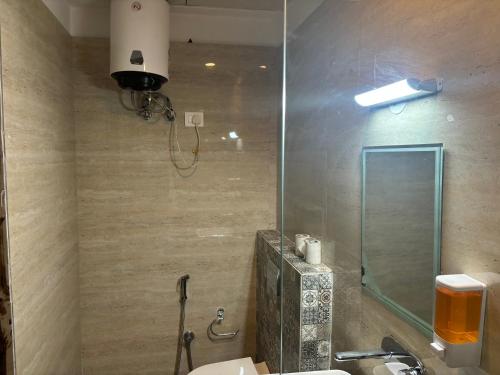 a bathroom with a sink and a mirror at Hotel Life Inn in Jaipur