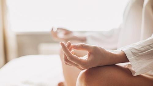 a pregnant woman performing yoga on her stomach at De Kloof Heritage Estate and Wellness in Swellendam