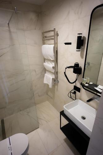 Koupelna v ubytování Zagorod Hotel