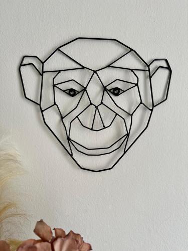 a drawing of a bear head on a wall at Die Stadtkanzlei in Klagenfurt
