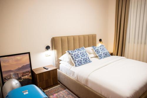 Ένα ή περισσότερα κρεβάτια σε δωμάτιο στο Terra'Vista Apartments