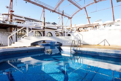 a swimming pool on a cruise ship at El Pacha Suites Sharm - Adults Only in Sharm El Sheikh