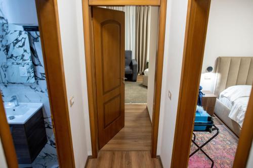 Ένα ή περισσότερα κρεβάτια σε δωμάτιο στο Terra'Vista Apartments