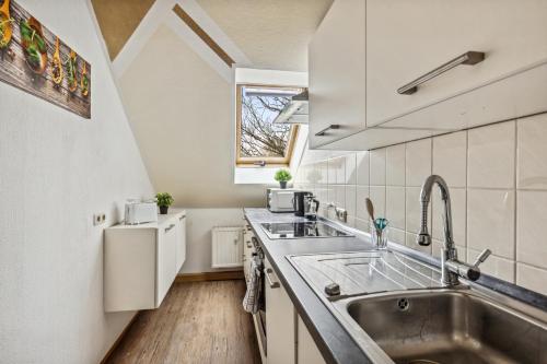 Ett kök eller pentry på YourFavoriteBed - Moderne Monteurwohnungen in Zwickau