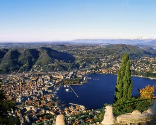 an aerial view of a city and a lake at Alle Vigne 5 in Brunate
