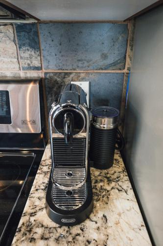 a toaster sitting on top of a kitchen counter at Tremblant Prestige - Altitude 170-5 in Mont-Tremblant