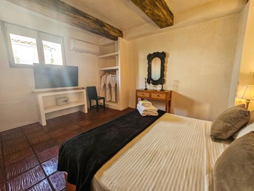 Postel nebo postele na pokoji v ubytování Casa Be Getsemaní