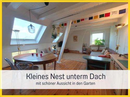 Ruang duduk di Fewo Kleines Nest strandnah optimal für Alleinreisende und Paare mit Haustier