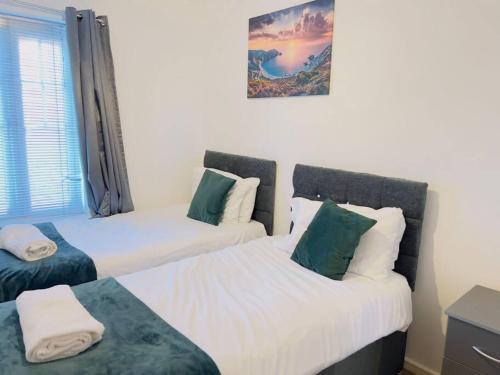 Postel nebo postele na pokoji v ubytování Starview Apartment-Vitoria