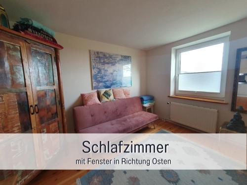 Ruang duduk di Fewo Kleines Nest strandnah optimal für Alleinreisende und Paare mit Haustier