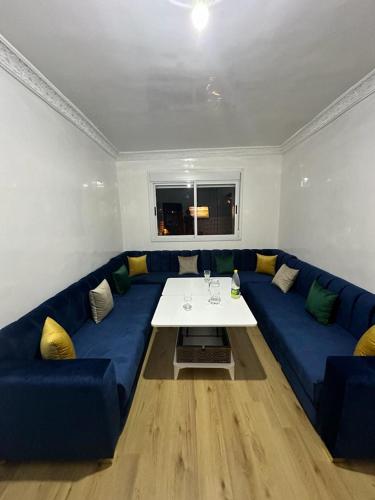 Χώρος καθιστικού στο Appartement chic bien équipé à Tanger