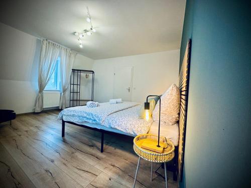 Ένα ή περισσότερα κρεβάτια σε δωμάτιο στο One Apartment's - Zentral - Steinweg
