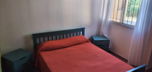 Ένα ή περισσότερα κρεβάτια σε δωμάτιο στο Deptos. Las Campanitas