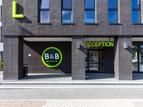 a brick building with a b b reception sign at B&B HOTEL Bad Hersfeld in Bad Hersfeld