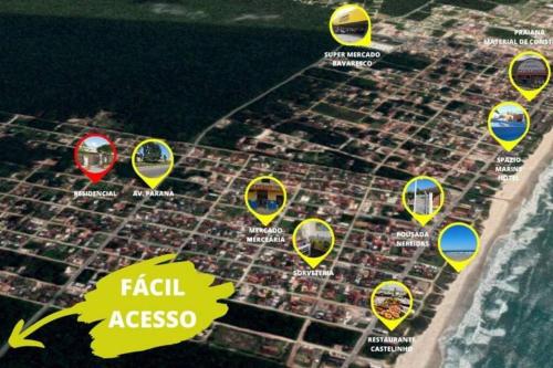 um mapa de uma praia com círculos amarelos e vermelhos em Casa boa e barata em Guaratuba em Guaratuba