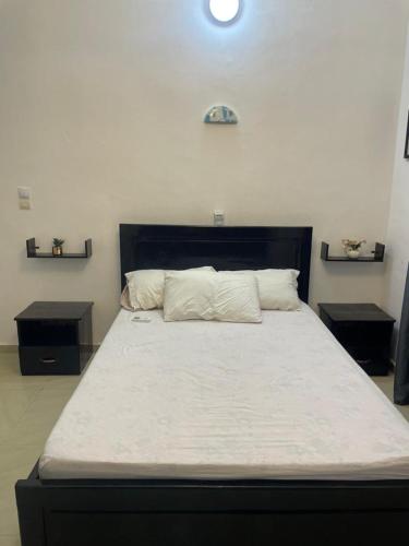 Tempat tidur dalam kamar di Timba chic-loge