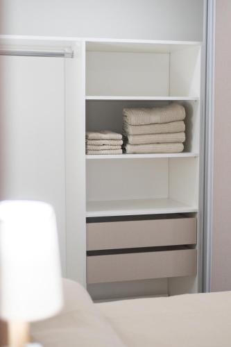 Cama ou camas em um quarto em CostaZen