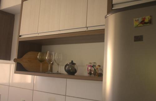 A cozinha ou cozinha compacta de Apartamento de Praia