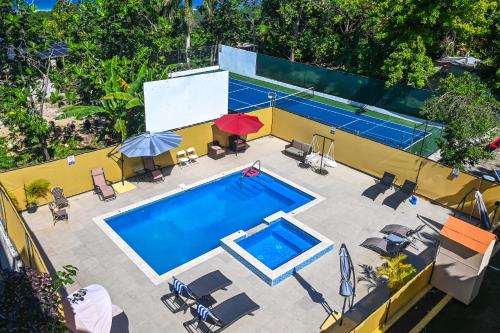 Uma vista da piscina em Takuma Boutque Hotel Hotel Rooms & Suites ou nos arredores