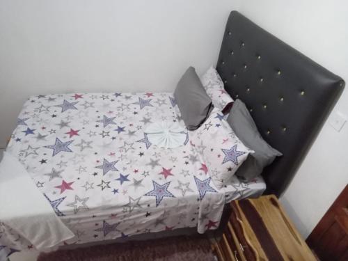 Letto o letti in una camera di Chic Vybz Deluxe