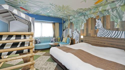 a bedroom with a bed and a mural of zebras at Grand Mercure Nasu Highlands Resort & Spa in Nasu