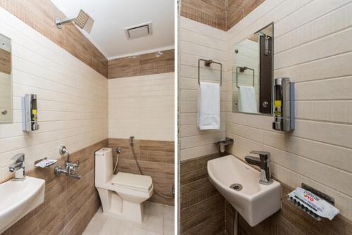 ボーパールにあるHotel Trishlaのバスルーム(トイレ、洗面台付)の写真2枚