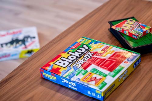 two boxes of legos sitting on a table at FuranoSky - White in Furano